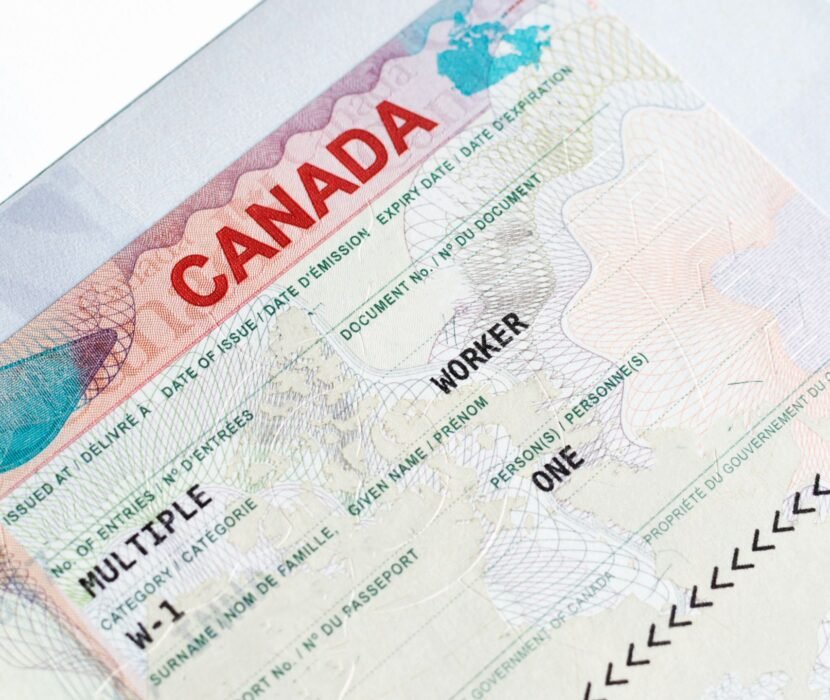 artist visa lawyer Regina reviewing Canadian performer immigration documents