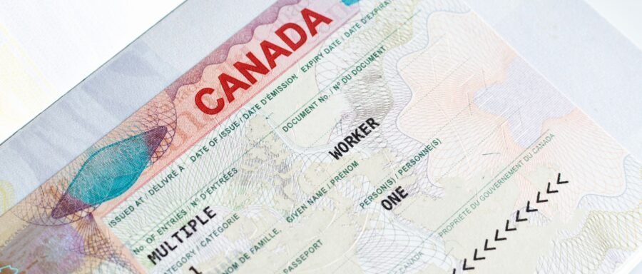 artist visa lawyer Regina reviewing Canadian performer immigration documents