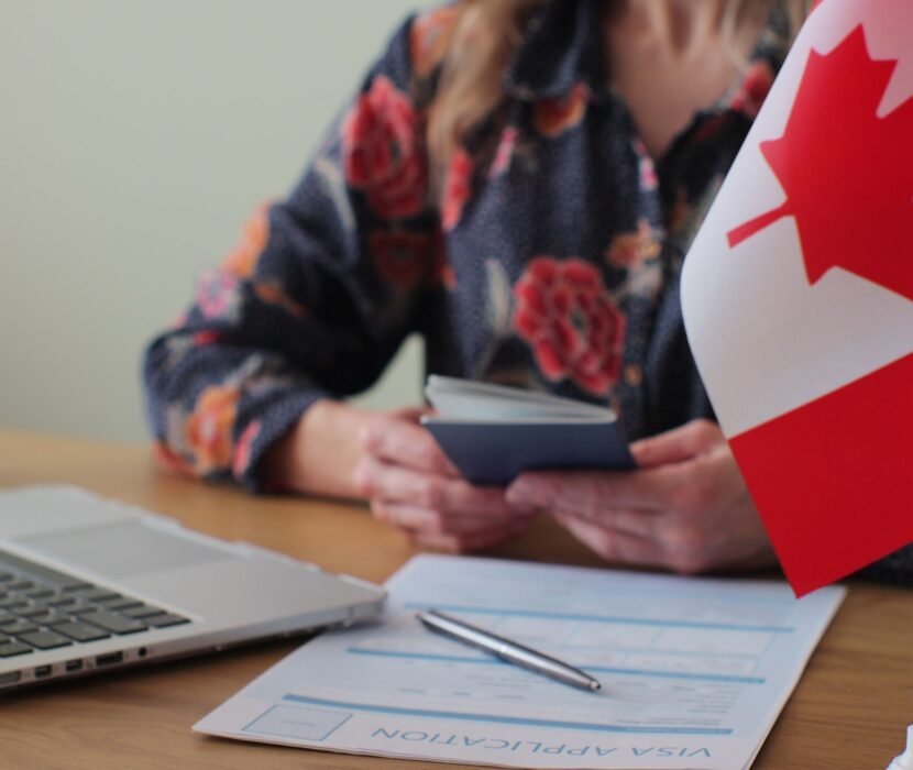 emergency visa lawyer Regina reviewing urgent Canadian visa documents