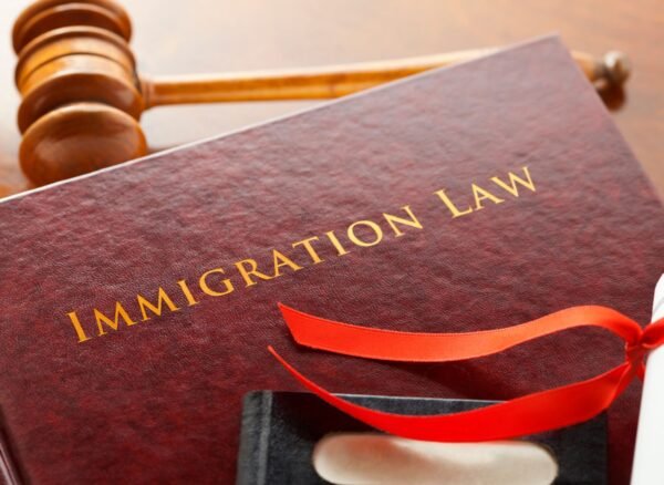 immigration lawyer Regina reviewing Canadian immigration application documents
