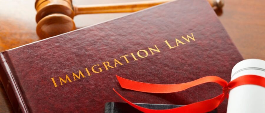 immigration lawyer Regina reviewing Canadian immigration application documents