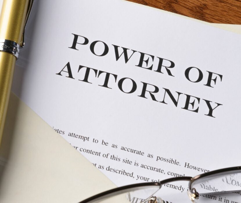 power of attorney lawyer Regina reviewing legal authorization documents