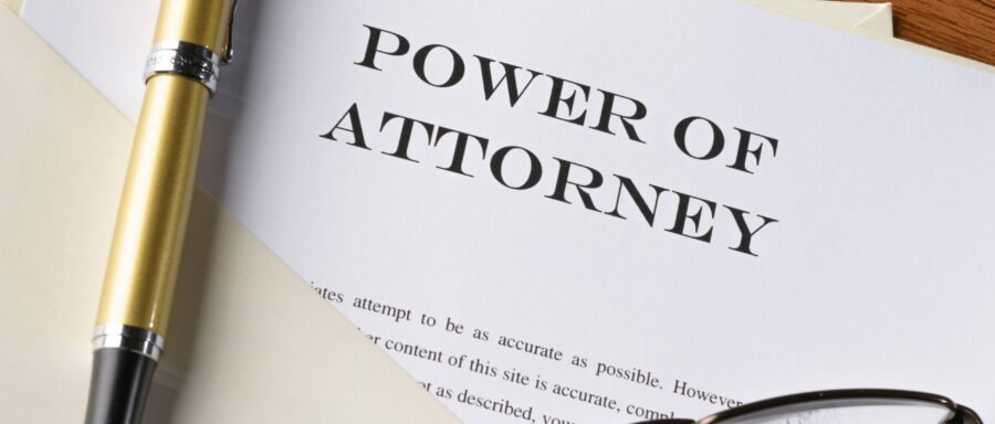 power of attorney lawyer Regina reviewing legal authorization documents