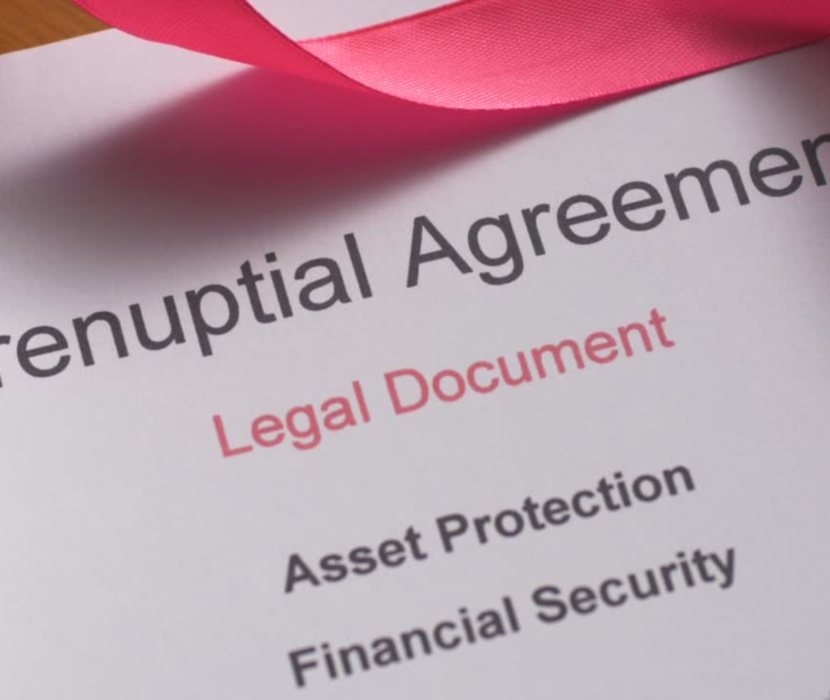 prenuptial agreement lawyer Regina reviewing family property documents
