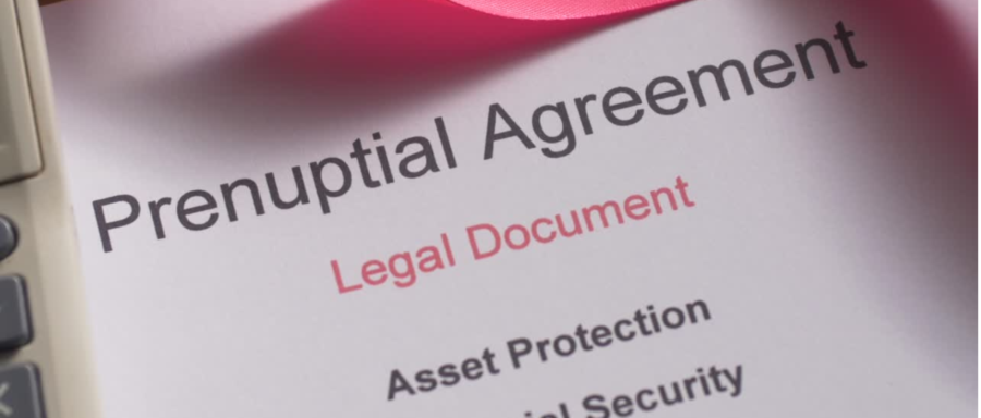 prenuptial agreement lawyer Regina reviewing family property documents
